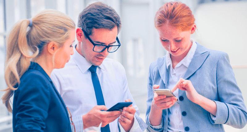 3 people looking at their mobiles (1)